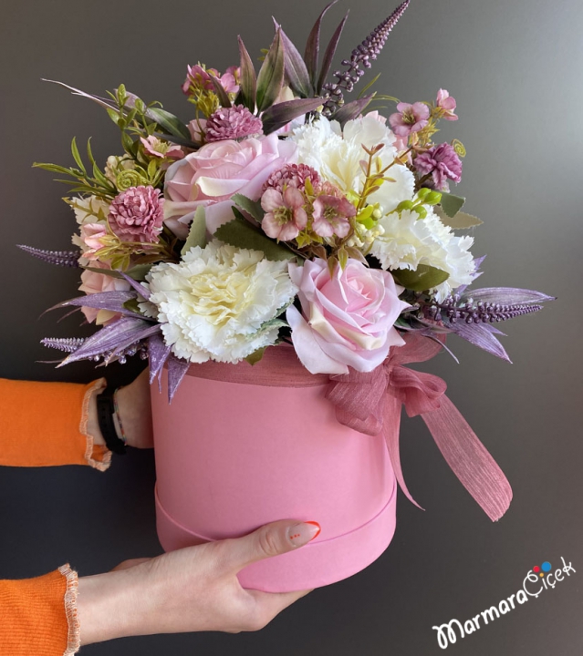 Artificial Flowers in a Pink Box
